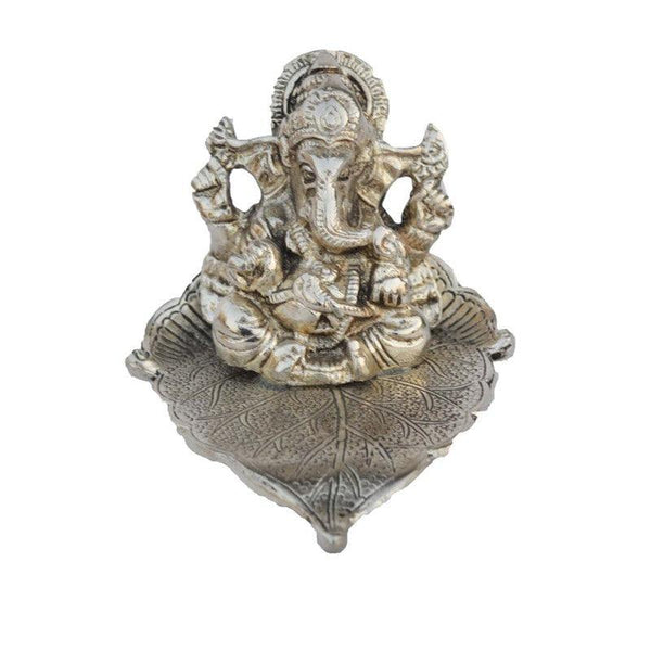 Religious craft titled 'Silver Lord Ganesha Statue on Leaf', 4x4x4 inches, by artist E Craft on Metal