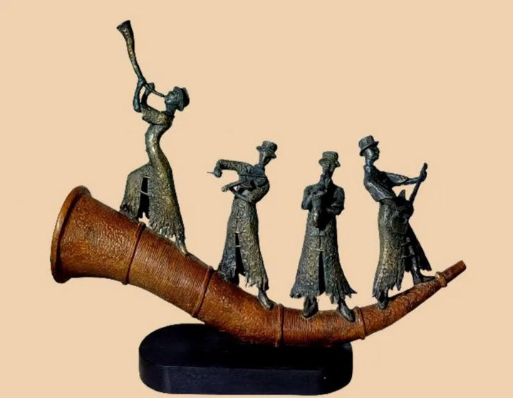 Figurative  sculpture titled 'Symphony', 28x35 inch, by artist Subrata Paul on Bronze