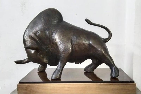 Animals sculpture titled 'The Bull', 9x12x6 inches, by artist Dilip Paul on Bronze