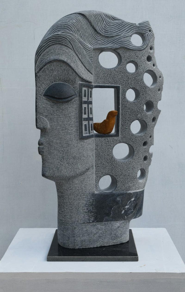 Figurative sculpture titled 'The Face', 33x20x7 inches, by artist Pankaj Gahlot on Black Marble