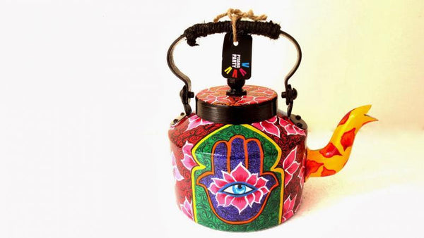 Lifestyle craft titled 'Third Eye Tea Kettle', 9x9x7 inches, by artist Rithika Kumar on Aluminium