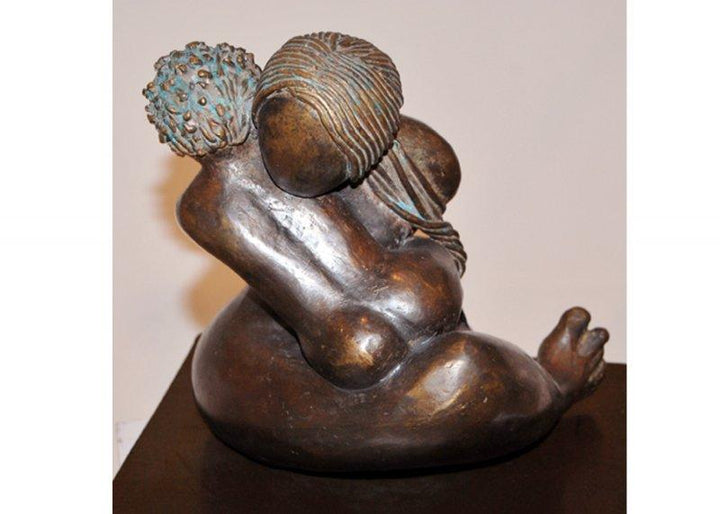 Figurative Metal sculpture titled 'Unconditional Love 2', 10x9x10 inches, by artist Sunita  Lamba on Bronze