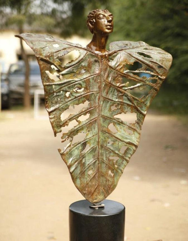 Figurative sculpture titled 'Unique Form', 43x27x14 inches, by artist Shivarama Chary Y on Bronze