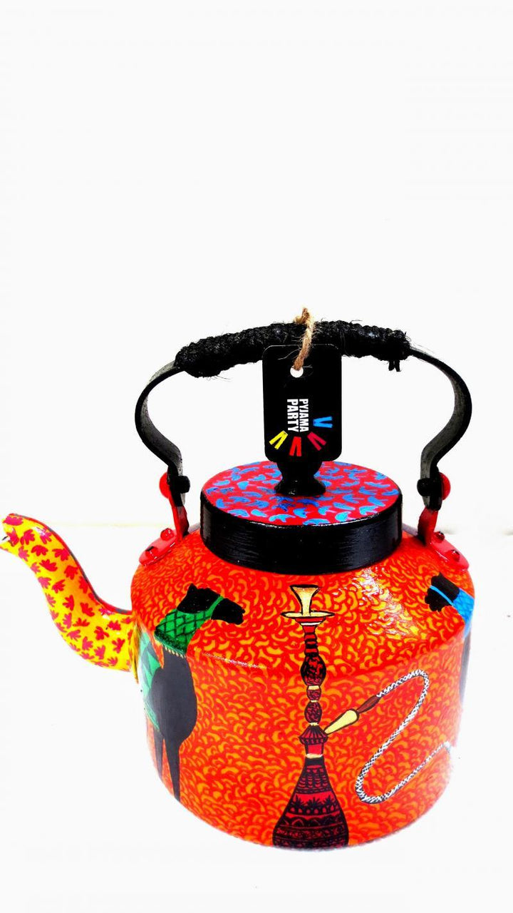 Lifestyle craft titled 'Vibrant Tea Kettle', 9x9x7 inches, by artist Rithika Kumar on Aluminium