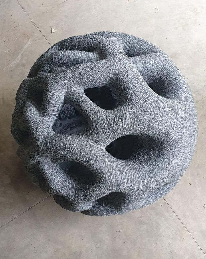 Abstract sculpture titled 'Void', 18x18x18 inches, by artist Nema Ram on Black Marble