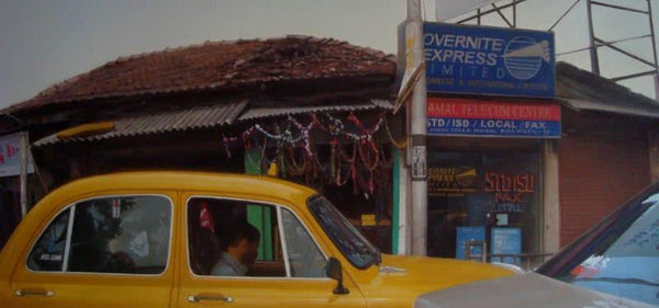 Cityscape oil painting titled 'Wind Of Change2', 24x48 inches, by artist Anupam Halder on Canvas